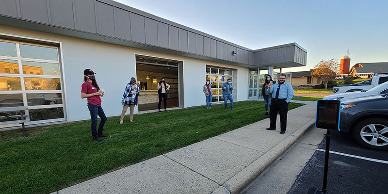 Orases team outside of office headquarters