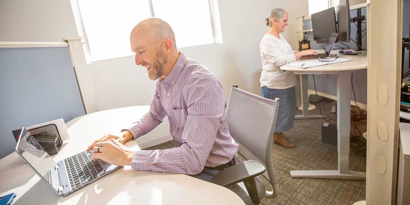 Two system integration specialists working